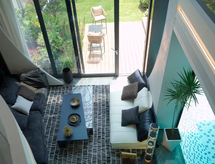 Open Living and Dining Space with Garden View – County Villas